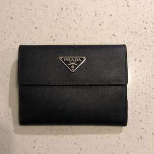 Black Prada leather wallet 5 inches by 4 inches